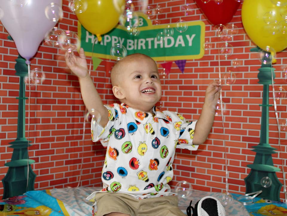 Francisco celebrating his second birthday Sesame Street style