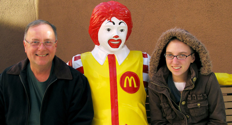 RMHC Family with Ronald McDonald bench outside of the rmhc