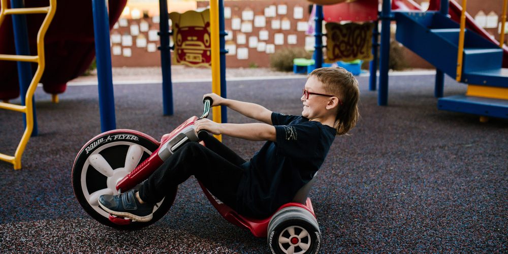 In our backyard playground, kids can do what they do best: have fun!